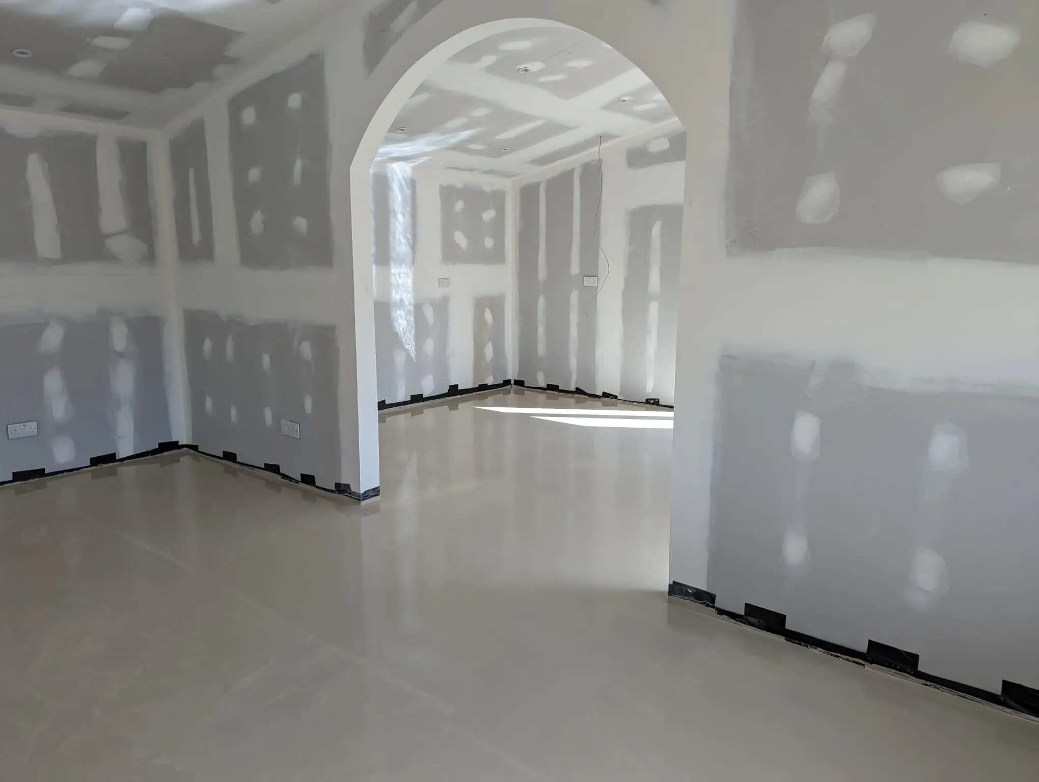freshly screed floor in archway